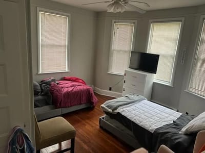 Private resident room with beds and windows