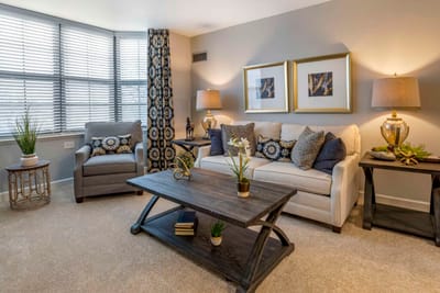 Cozy living room with comfortable seating and decor.