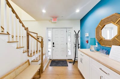 Welcoming entrance area with seating and decor