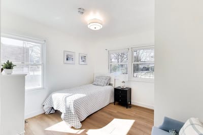 Bright, airy interior of a resident's room.