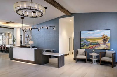 Modern lobby with seating area and artwork