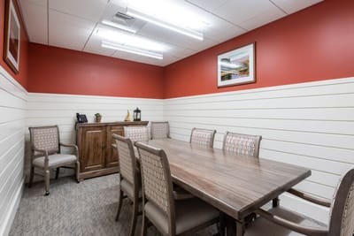 Conference room with a large table and chairs
