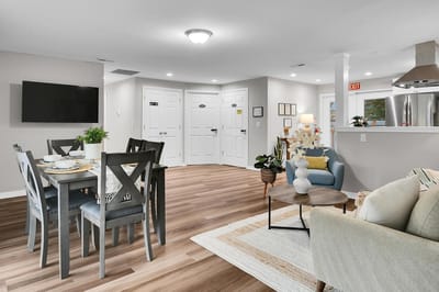 Welcoming common area with dining table and seating