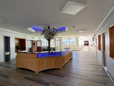 Magnolia Adult Day Care, assisted living in Fort Lee, NJ — Modern reception area with decorative overhead lighting