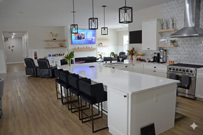 Modern common area with a kitchen and seating
