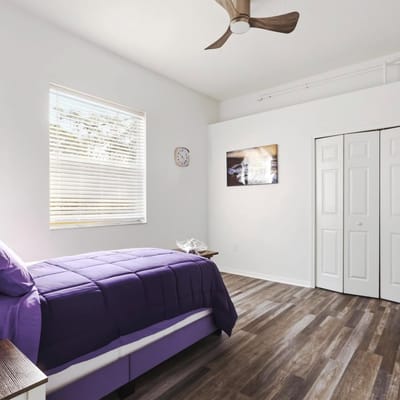 Comfortable resident room with a single bed and natural light