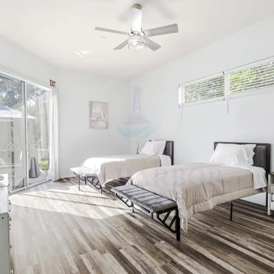 Bright, airy resident room with two beds
