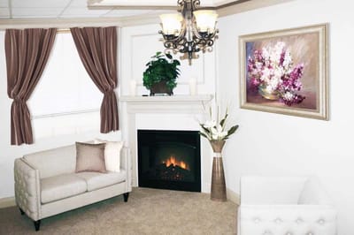 Interior view of a cozy seating area with a fireplace