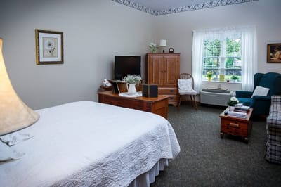 Cozy private resident room with comfortable furnishings