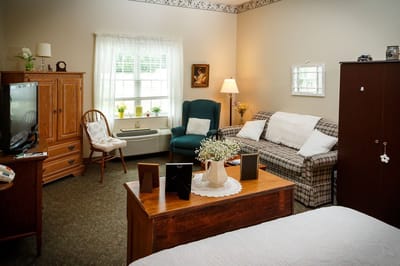 Cozy interior of a resident room with furniture