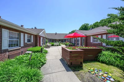 Outdoor view of a landscaped courtyard with seating