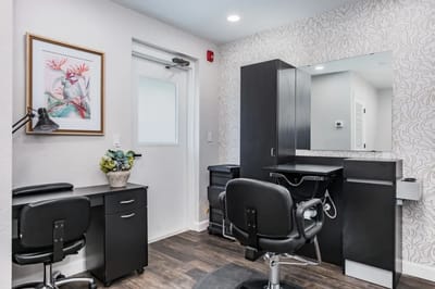Well-designed hair salon area with stylist chairs