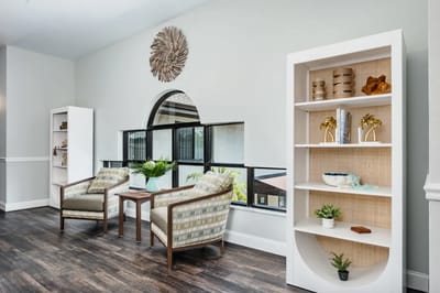 Bright common area with seating and decor