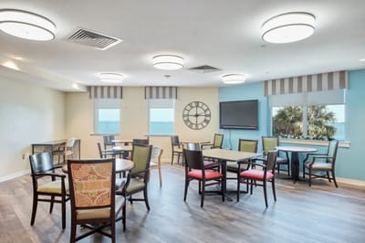 Bright common area with tables and chairs