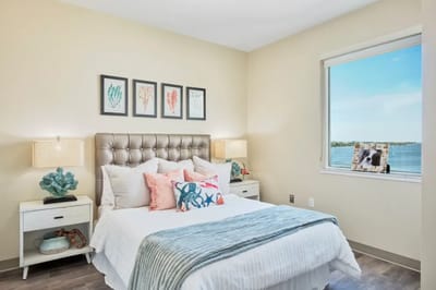 Brightly decorated resident room with a scenic view