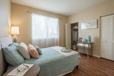 Cozy bedroom with natural light and inviting decor