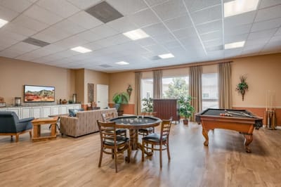 Interior common area with seating and a pool table