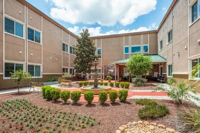 Beautiful courtyard area with benches and landscaping
