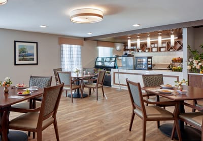 Bright dining area with tables set for meals