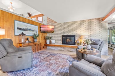 Cozy interior lounge area with fireplace and seating