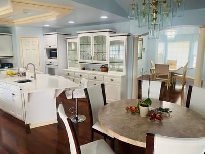 Bright and spacious common area with a dining table