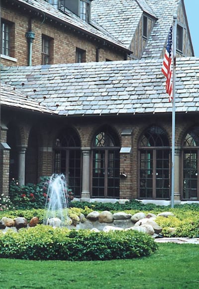 Outdoor courtyard with fountain and American flag