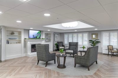 Cozy common area with seating and a fireplace