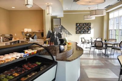 Interior view of a dining area with food display