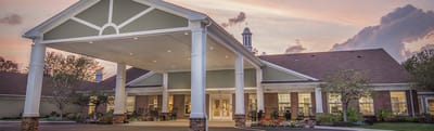 Exterior view of Orchard Heights at sunset