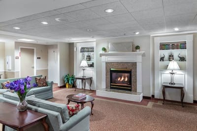 Common area with a fireplace and seating