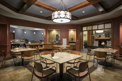 Elegant dining area with tables and chandelier