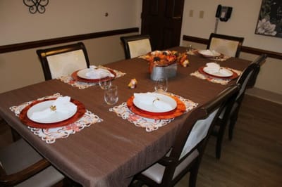 Well-set dining table in a communal dining area
