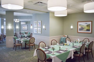 Dining area with tables set for a meal