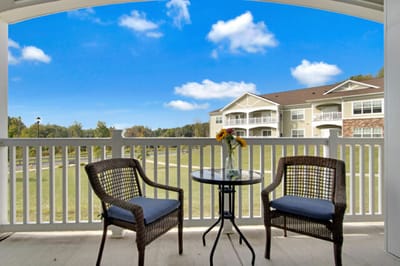 View of outdoor seating area with flowers