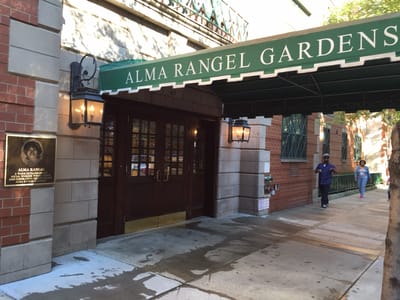 Entrance of Alma Rangel Gardens with signage