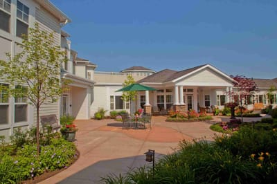 Outdoor courtyard with seating and landscaping