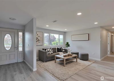 Bright common area with seating and decor