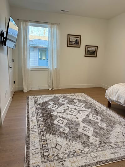 Cozy resident room with a bed and TV