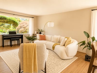 Bright common area with modern furniture and plants