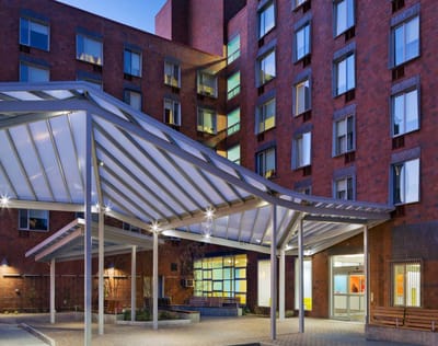 Entrance of a senior living facility with covered awning