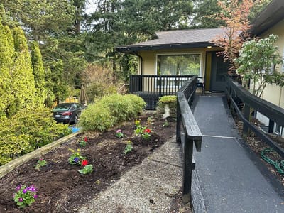 Exterior view of a facility with landscaped garden