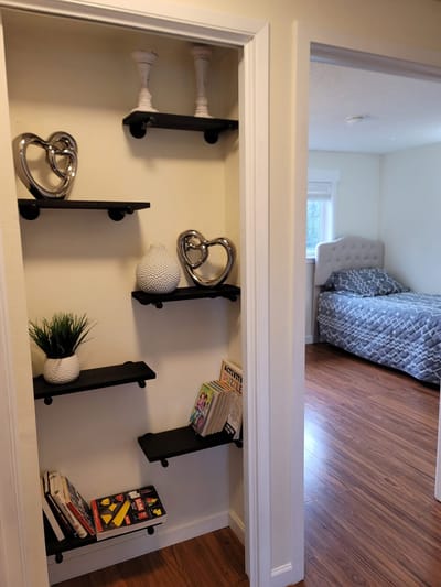Decorative interior shelf with books and plants