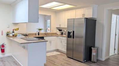 Bright kitchen area with modern appliances