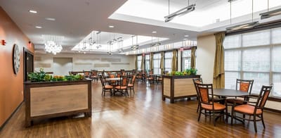 Bright dining room with tables and chairs