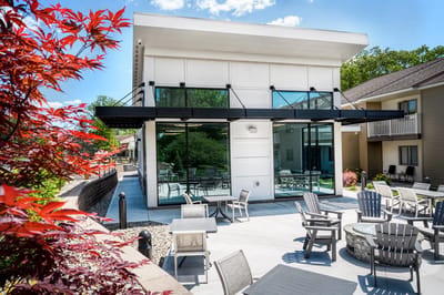 Outdoor seating area with a modern building