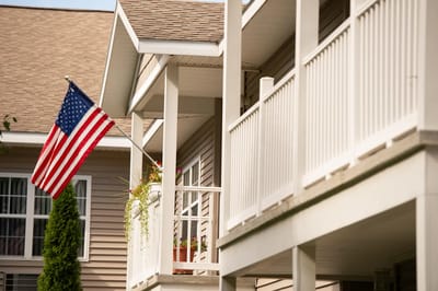 Exterior view of the facility with American flag