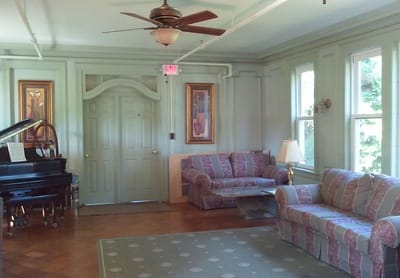 Common area with seating and a piano
