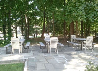 Outdoor seating area surrounded by trees