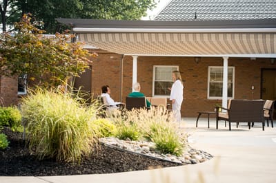 Residents enjoying the outdoor space of Kingsway Manor