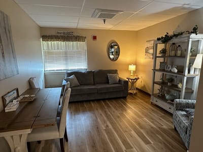 Cozy lounge area with sofa and decorative elements